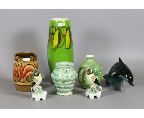 A collection of pottery to include Poole, Aviemore pottery etc.