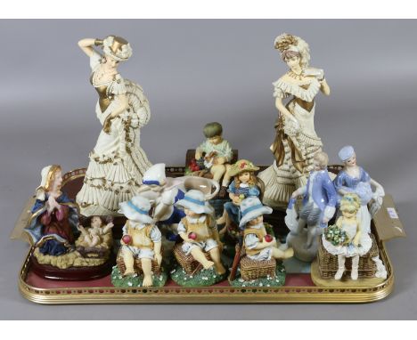 A tray lot of figurines to include composite and ceramic examples.