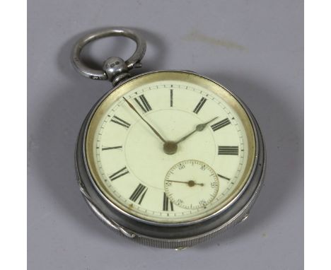 A silver cased pocket watch with enamel dial and subsidiary seconds.