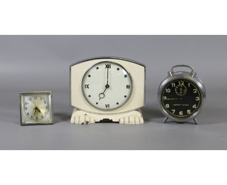 An Art Deco electric mantel clock, a chrome alarm clock and a bedside timepiece.