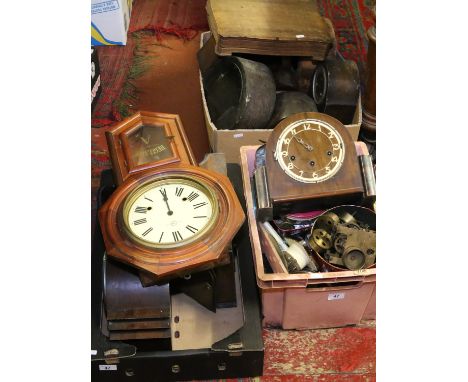 Three boxes of mantel clock cases and spare parts.