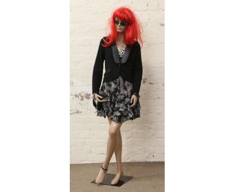 A Boutique shop window mannequin.
