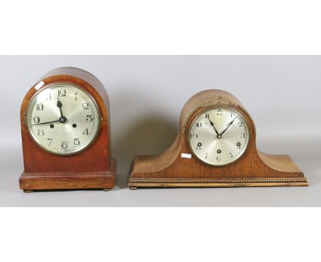Two oak cased eight day mantel clocks.