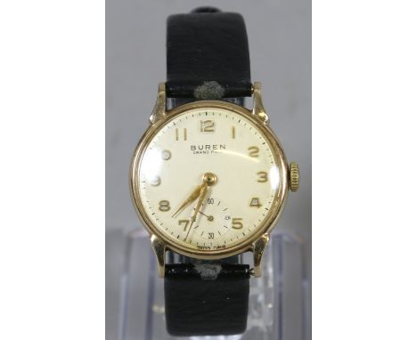 A gentlemens vintage 9 carat gold Buren Grand Prix manual wristwatch. With tear drop lugs, applied gold Arabic numeral marker