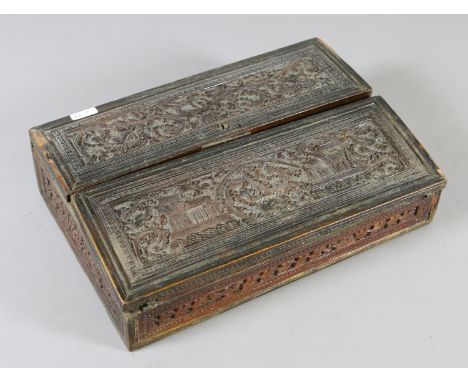 An old carved writing box and a milchglas oil lamp.