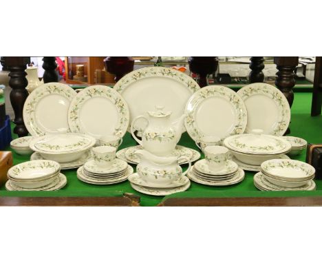 A Royal Doulton dinner and coffee service decorated in the 'Clairmont' design including dinner plates, coffee pot, cups, sauc