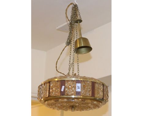 A retro 1970s coloured glass and veneered ceiling light.