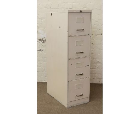 A vintage painted four high filing cabinet with brass handles.