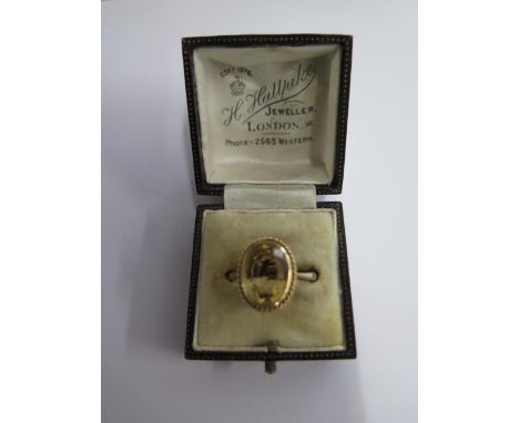 A 9ct yellow gold citrine ring, size N, approx 3.6 grams, in generally good condition 