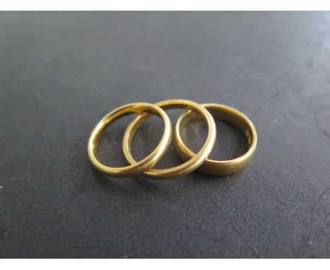 3 x 22ct hallmarked yellow gold band rings, sizes M/N and R, total weight approx 14.4 grams 