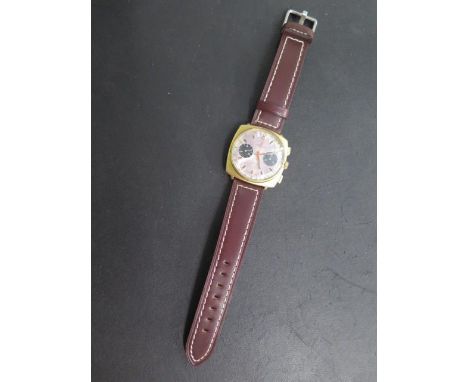 A Brietling Top Time 1960's gold plated cushion shaped gentleman's manual wind chronograph wristwatch with Panda dial and tex