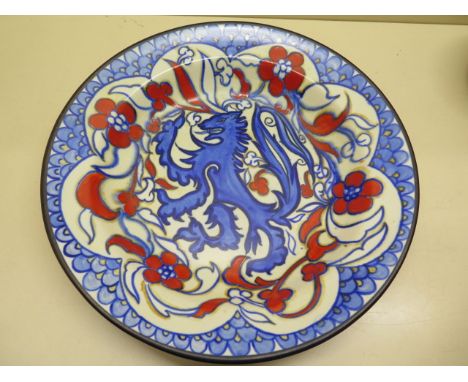 A 19th century early 20th century Wardle Pottery dish, well decorated with a lion and roses surrounded by a scale border, imp