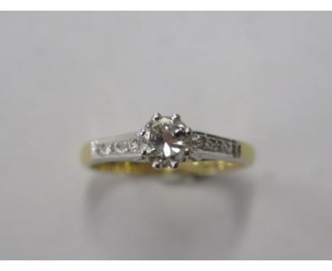 A hallmarked yellow gold diamond ring, approx 0.40ct centre stone, size M, approx 3.2 grams, visible inclusion but generally 