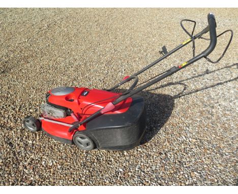 A Snapper self propelled petrol lawn mower with a Briggs and Stratton engine, in running order 