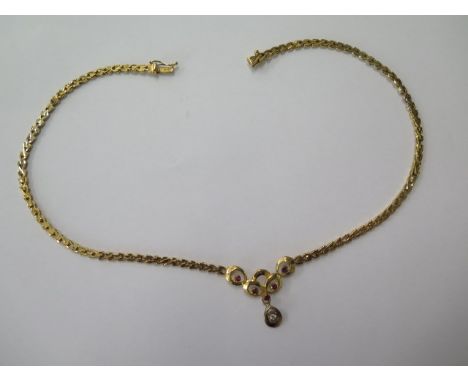 A hallmarked 9ct yellow gold ruby and diamond necklace, 41cm long, approx 19 grams, one link will need attention as it is loo
