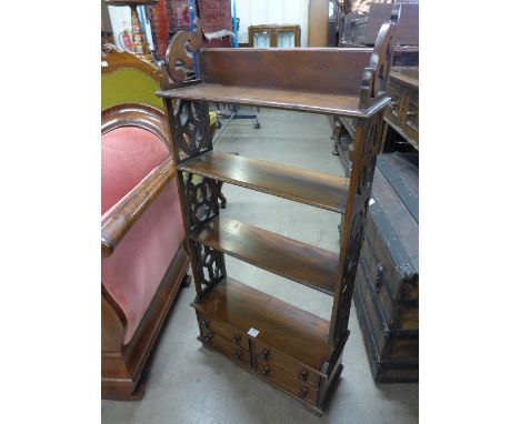 A Chippendale style mahogany open wall hanging bookcase