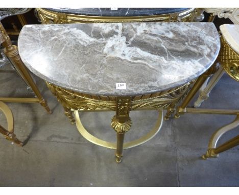 A reproduction French Louis XV style gilt console table