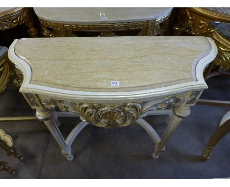 A reproduction French Louis XV style cream console table