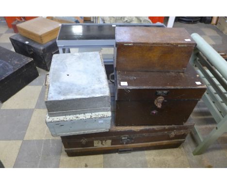 A trunk and four assorted boxes