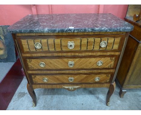 A French Louis XV style inlaid kingwood and marble topped commode