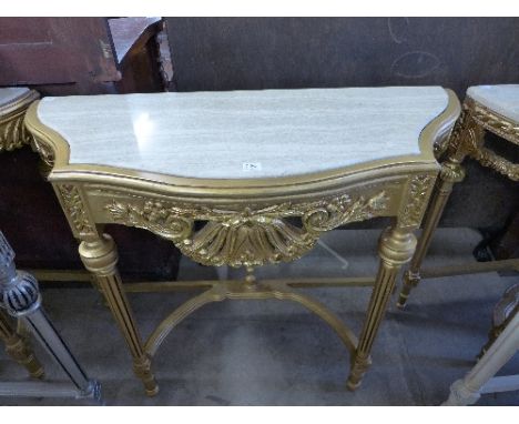 A reproduction French Louis XV style gilt console table