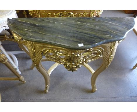 A reproduction French Louis XV style gilt console table