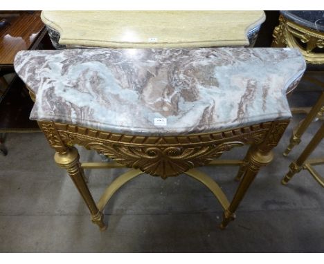 A reproduction French Louis XV style gilt console table
