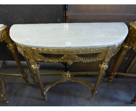 A reproduction French Louis XV style gilt console table