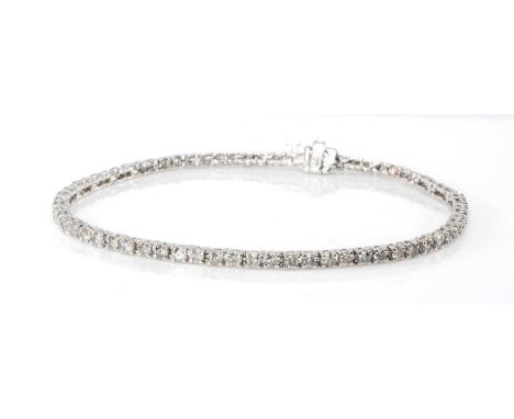 14K WHITE GOLD DIAMOND LINE / TENNIS BRACELET, 19.5cms (l), 7.1gms in boxProvenance: private collection PembrokeshireComments