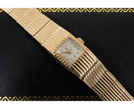 ROLEX 9CT GOLD LADIES' BRACELET WATCH, jewelled Swiss signed Rolex manual wind movement, square dial with Arabic numerals, in