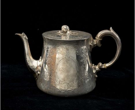 VICTORIAN SILVER TEAPOT, Goldsmiths Alliance, London 1869, tapering circular with foliate engraving and blank cartouche, flus