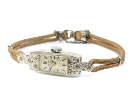 WHITE METAL ROTARY COCKTAIL WATCH set with diamonds, engraved inside 'Gold & Plat'Provenance: private collection Carmarthensh