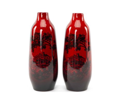 PAIR ROYAL DOULTON FLAMBÉ WOODCUT VASES, shape 1614, decorated with a castle on a hill with tree in the foreground, 15cms (h)