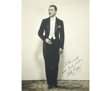 LUGOSI (Bela, 1882-1956) Portrait photograph of Lugosi wearing white tie and tails in classic pose, signed and inscribed in i