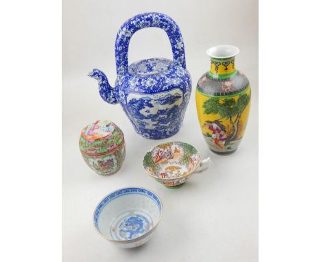 A Chinese blue and white porcelain tea pot, decorated with vignettes to each side on a foliate ground, together with a famill