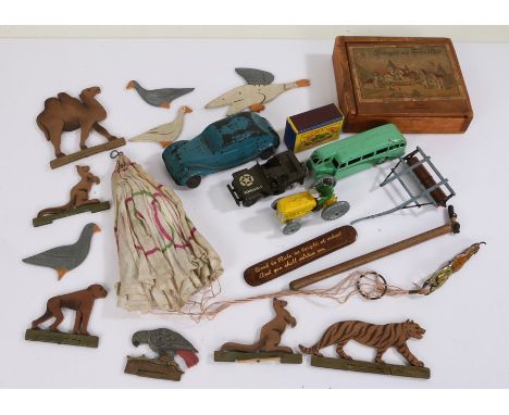 Toys to include Dinky coach, tractor, Tri-ang jeep, wooden animals, parachutist with metal body, Burgen und Schloffer buildin