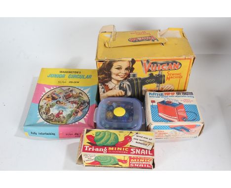 Children's toys and games, to include Vulcan sewing machine, Amanda Ann twin bunk beds for dolls, Katie pop up toaster, Sooty
