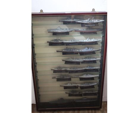 Collection of 22 model ships, to include HMS Hood, USS Missouri, Admiral Graf Spee, housed in a glazed cabinet