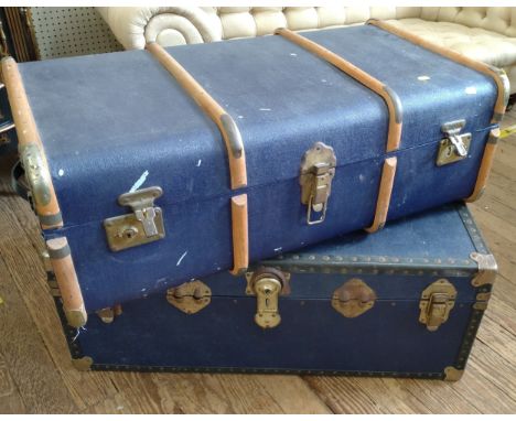 Two Travel trunks. 20th century. Top trunk: 33 x 90 x 48cm, bottom trunk: 35 x 90 x 50cm. 
