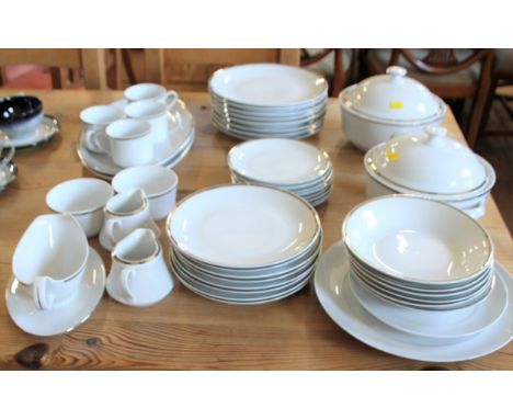 A Bohemia Porcelain white with silver rim dinner service comprising two tureens with lids, eight large, eight mediu and eight