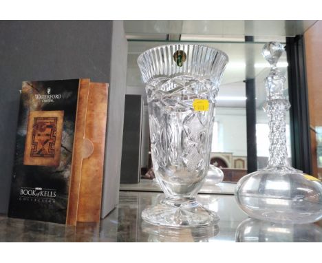 A Waterford Crystal Book of Kells Collection vase with leaflet in original lidded box 22cm; and a decanter with stopper 26cm 