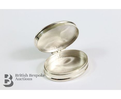 Silver pill box, the lid enamelled with a Bugatti racing car, approx 4 x 3 cms.&nbsp;