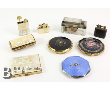 Silver and enamel compact with a RAF motif, Birmingham hallmark, dated 1940, approx 8 x 8 cms; navy blue Stratton compact, a 