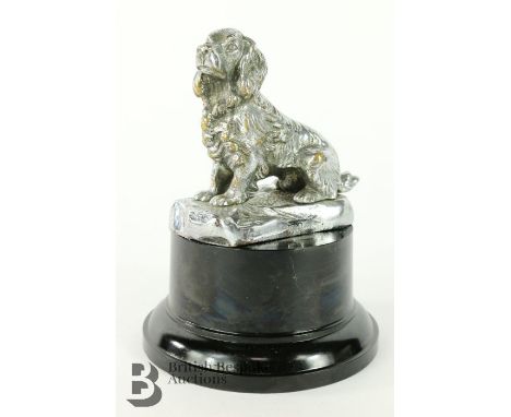 1930's Desmo 'Spaniel Dog' seated, with Desmo markings, original chrome-plating on brass, good detail, mounted on a display b