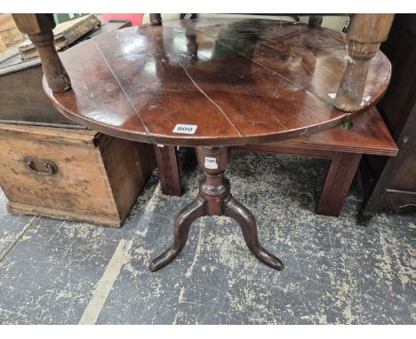 A 19th century yew wood tripod table.Diameter 75, height 72 cm