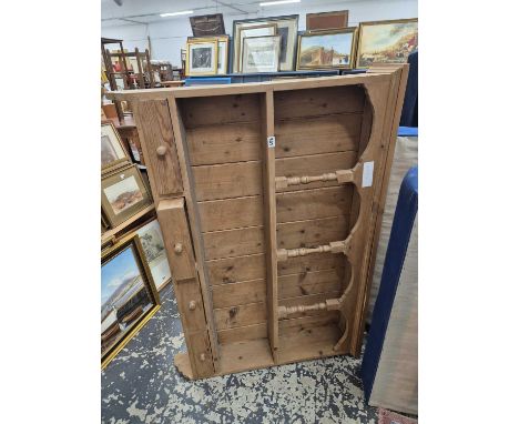 A modern pine kitchen shelf rack.