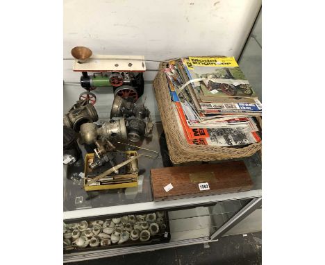 Model Engineering magazines, a live steam steam roller, a live fuel propeller engine, cycle lamps, etc.