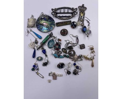 Jewellery to include a pair of Native American stud earrings, and a further single earring, a silver multi-drop pendant, micr