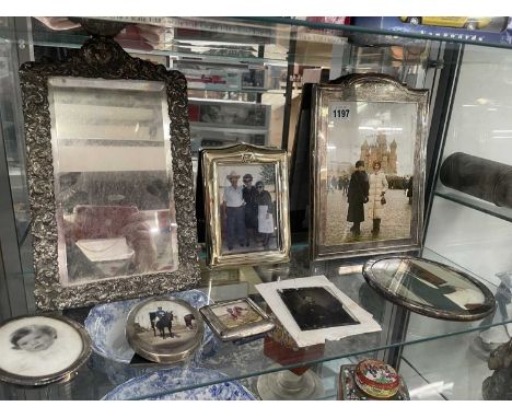 Silver and plated photograph frames together with an ambrotype photograph
