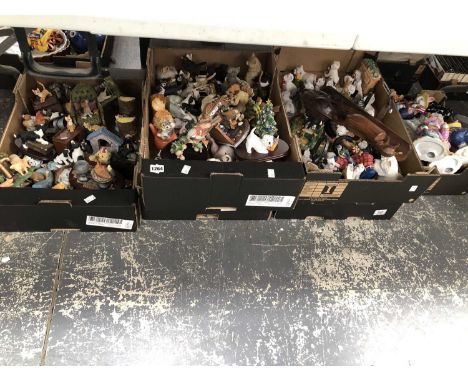 A large quantity of composition and ceramic dog, bird and other animal figures